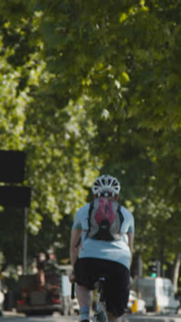 Vertical-Video-Of-Pedestrians-Cyclists-Traffic-Commuting-Work-The-Embankment